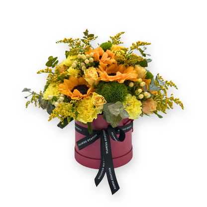 Sunflowers in a Pink Hat Box